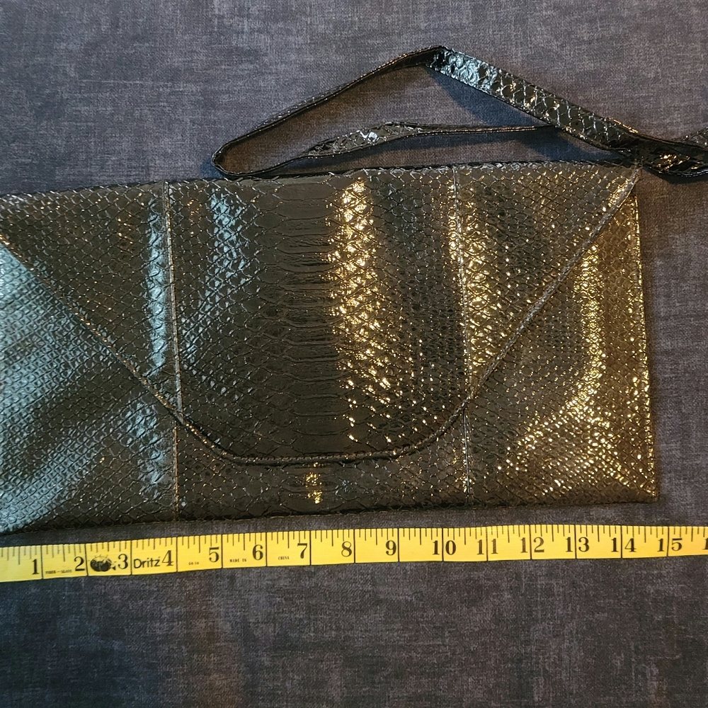 Oversized black clutch